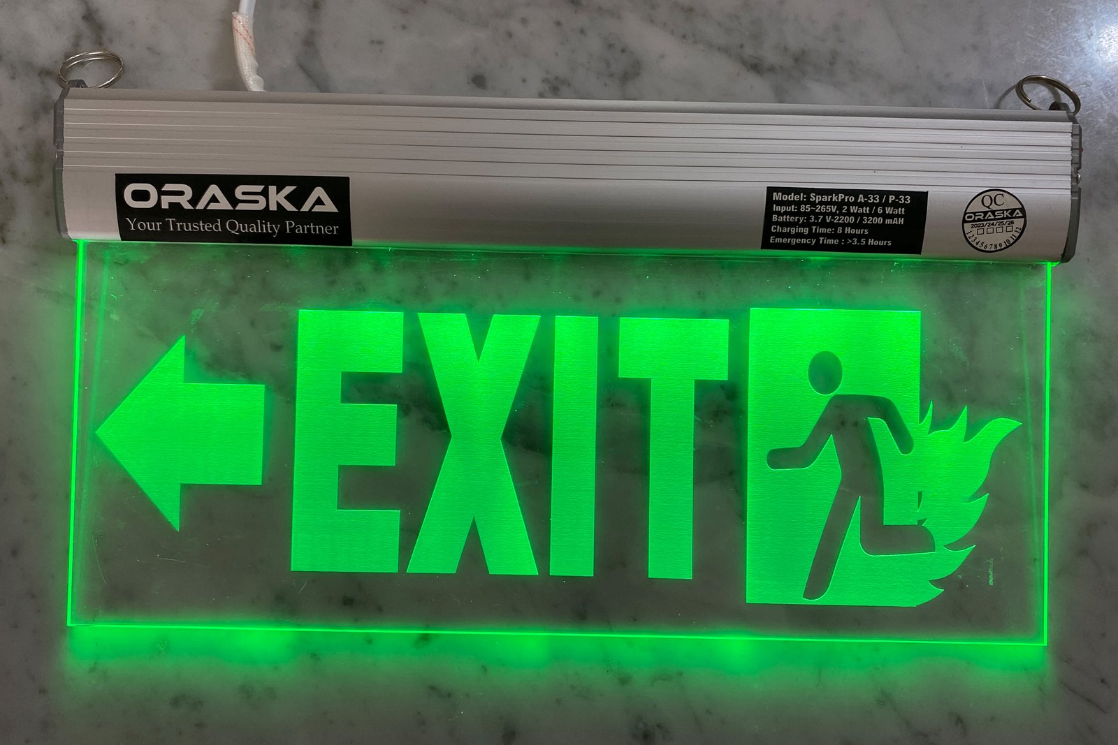 ORASKA Emergency Exit Sign Light SparkPro A-33 14 by 8 inch Clear Exit Fire Left Arrow